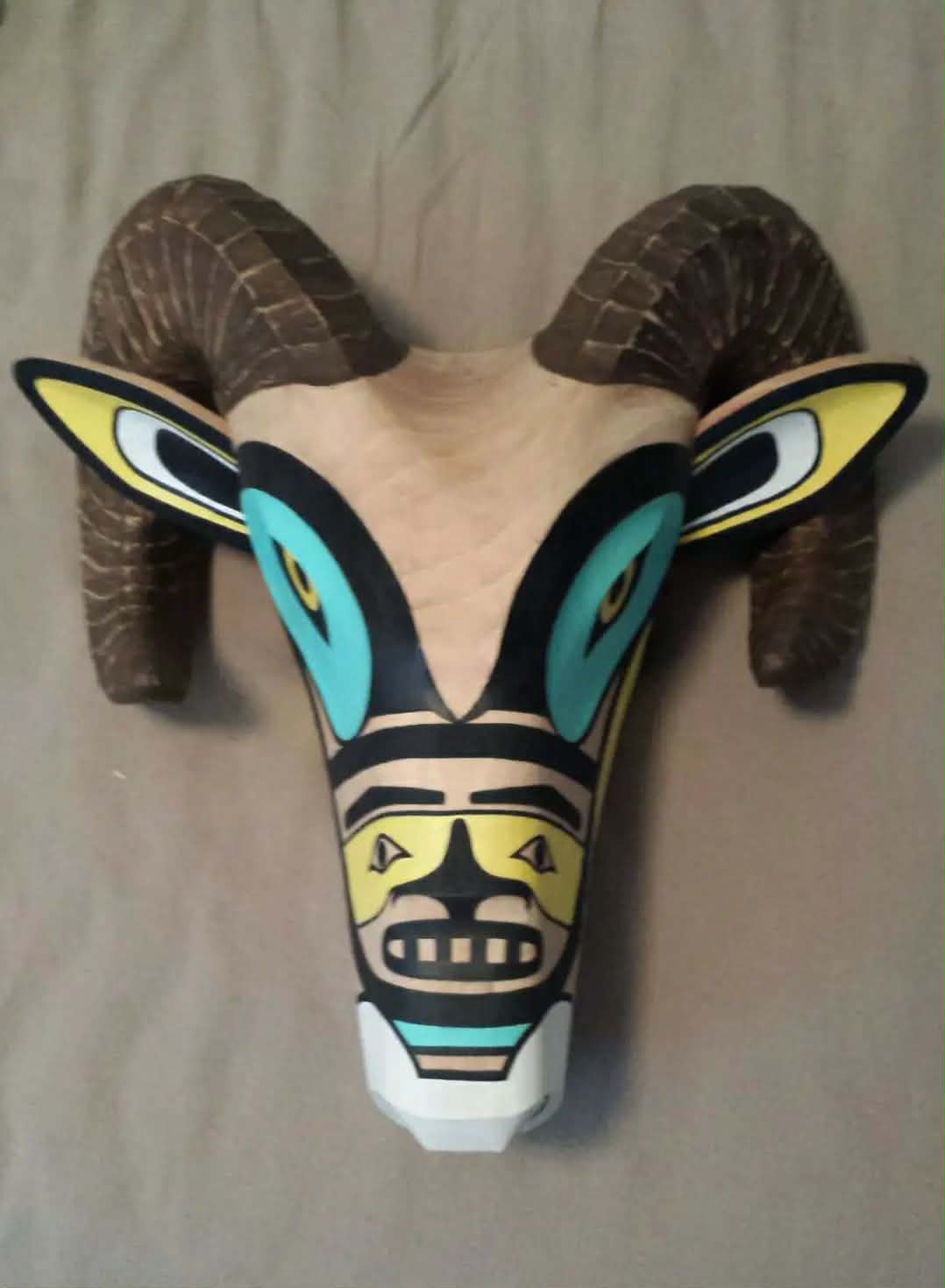 Carved mountain goat head, front view