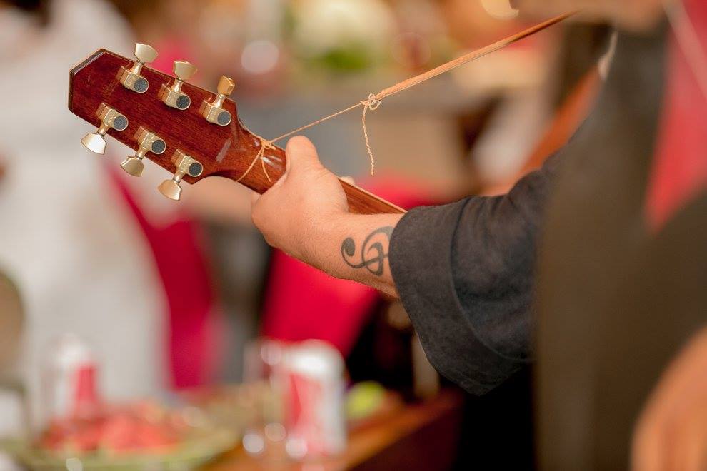 Gary performing at his sister's wedding